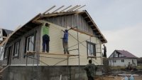 Строительство новых домов для погорельцев Подмосковья в Белоомуте завершится в октябре
